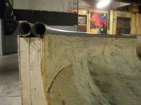 Coping on top of a quater pipe ramp.